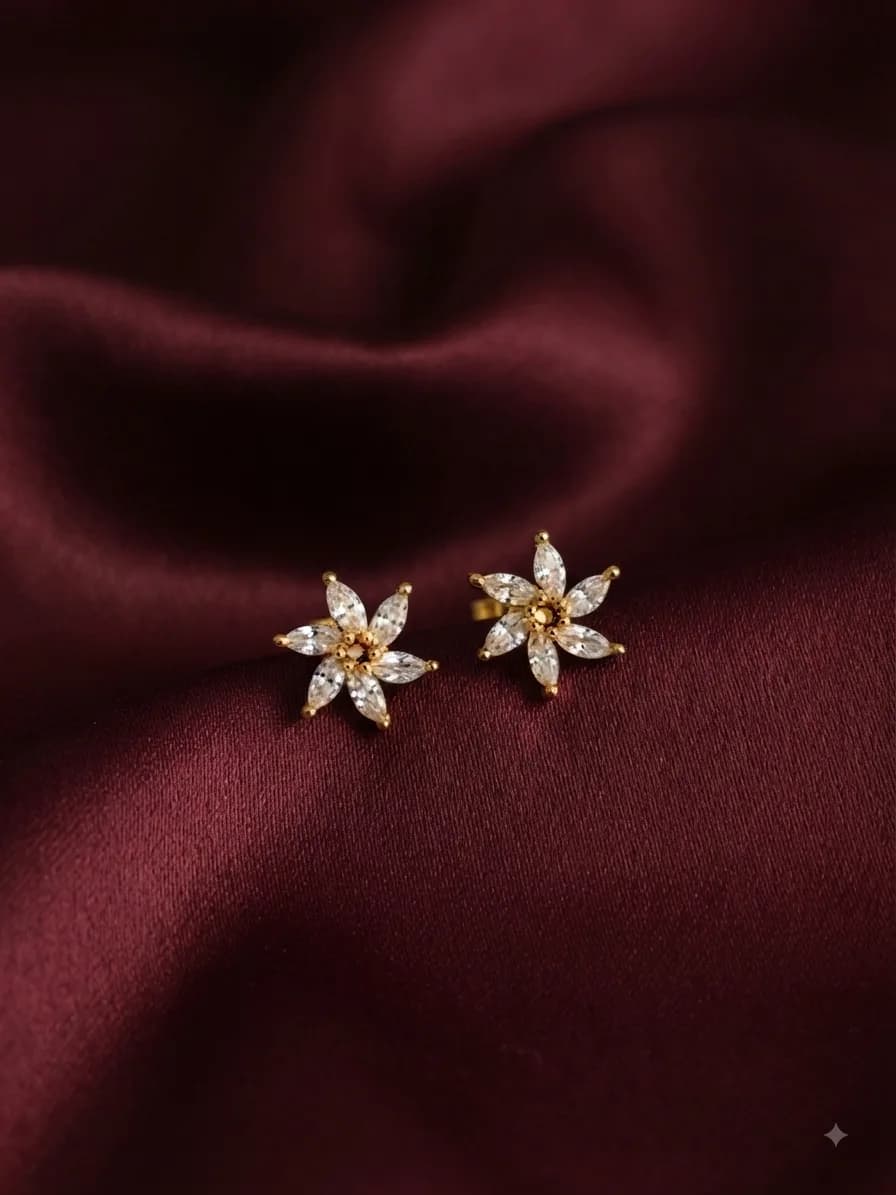 A slim plain gold-plated flower shape stud